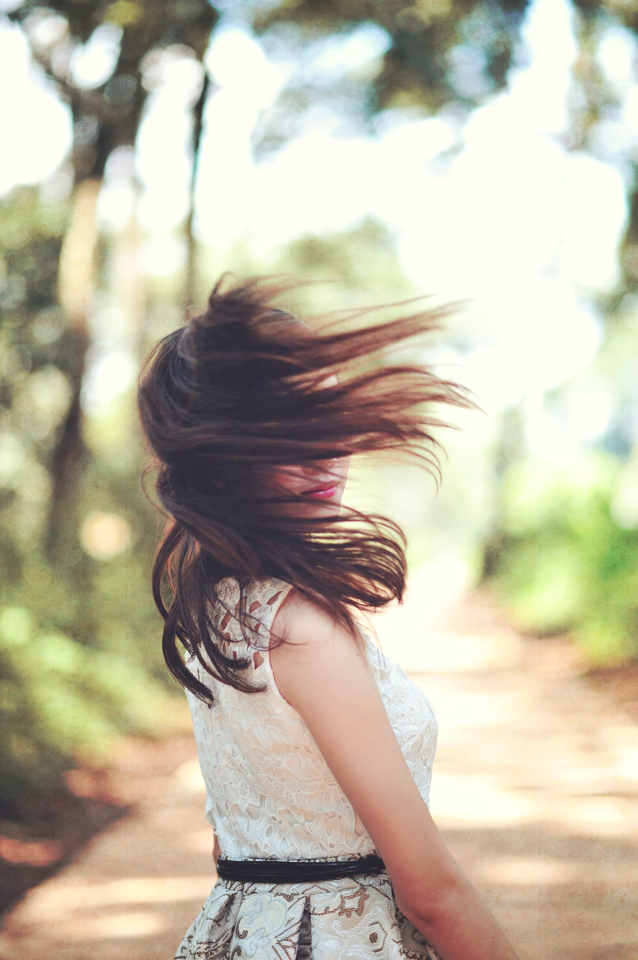 Woman checking hair